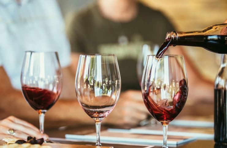 People drinking wine together in bar